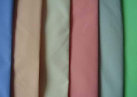 380T滌塔夫印花軋光時裝面料